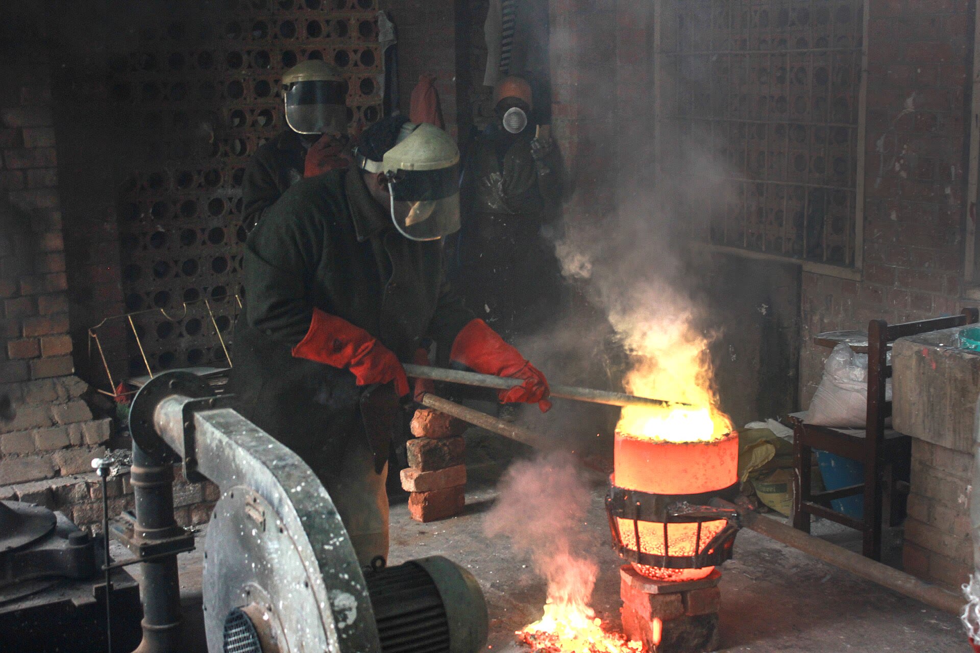 Molten metal poured from a ladle