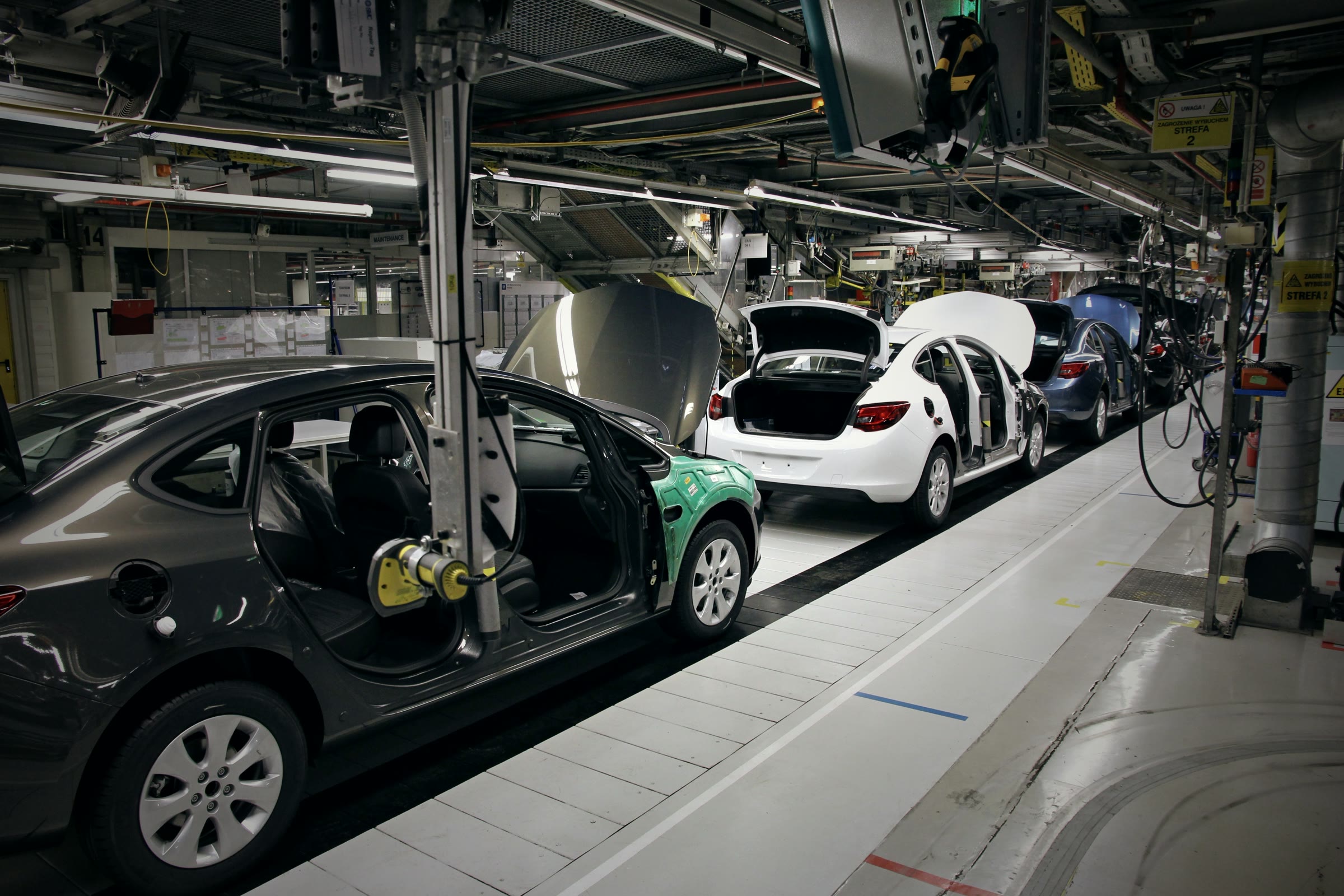 A car assembly line in a large automotive plant